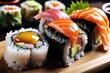 Sushi roll with salmon, tuna, avocado and on wooden table