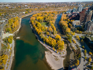 Wall Mural - Prince's Island Park autumn foliage scenery. Aerial view of Downtown City of Calgary, Alberta, Canada.