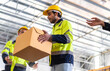© Art_Photo - Engineer team cargo shipping transportation ship loading move inventory cardboard boxes in factory distributions warehouse at logistics center.logistic industry and business import export