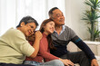 © Art_Photo - Portrait enjoy happy smiling love asian family.Senior mature father hug with elderly mother and young adult woman play laughing and having fun together at home.insurance concept