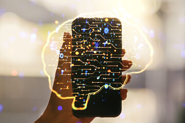 Wall Mural - double exposure of creative human brain microcircuit and hand with cellphone on background. future t