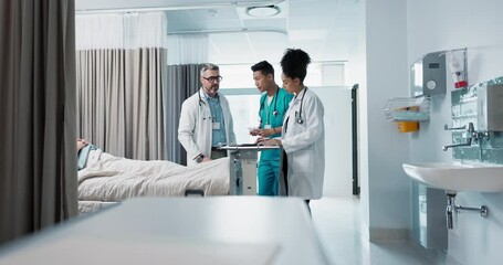 Wall Mural - Healthcare, hospital and a medical team of doctors checking on a patient in recovery or rehabilitation. Medicine, teamwork and consulting with a group of health professionals in a clinic for wellness