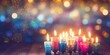 multi-colored holiday candles on a wooden table, against the background of a garland, banner, copy spase