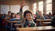 © ANC Media - Happy African-American Boy Raising Hand in a Vibrant Classroom