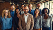 © Formoney - Portrait of smiling diverse business people standing in office and looking at camera.