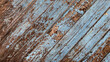 Close up background texture of wood planks with weathered and worn blue paint 