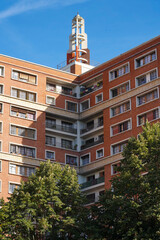 Wall Mural - Ivry-sur-Seine, France - 09 30 2021: View of the facade of a red brick building.