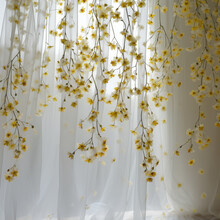 Tiny Yellow Flowers Hanging In Front Of Curtain