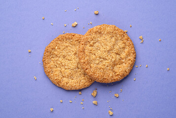 Two oatmeal cookies, top view with copy space