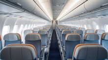 Commercial Airplane Cabin With Rows Of Seats And Overhead Bins