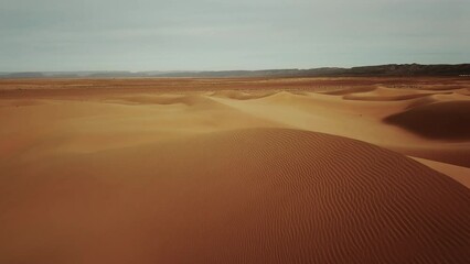 Wall Mural - aerial view on sand dunes in sahara desert, africa, 4k
