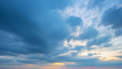 Wall Mural - .Time lapse stunning clouds float above the sea as the sun sets..scenery The beauty of the sky was mesmerizing in stunning sunset.Gradient color..Sky texture, abstract nature background.