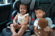 © themorningglory - Little child boy and girl sitting on carseta with seat belt safty traveltrip