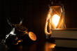 Vintage lamp and telephone. A study with rarities. A cozy atmospheric photo that transports us to another century
