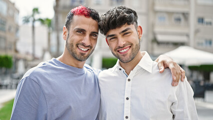 Poster - Two men couple smiling confident hugging each other at street