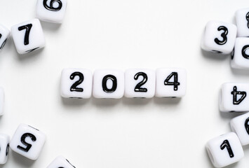 Wall Mural - 2024 year on white cube for preparation new year change and start new business target strategy conce