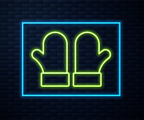 Wall Mural - Glowing neon line Pair of knitted christmas mittens icon isolated on brick wall background. Mitten icon. Merry Christmas and Happy New Year. Vector