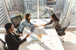 © Maria Vitkovska - Group of successful managers planning project, startup, working together in modern office