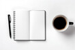 Empty notepad with coffee cup on white table