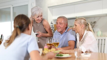 Wall Mural - Happy elderly friends spending free time together in kitchen of a nursing home - having lunch and chatting