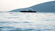 Luxurious motor yacht swimming through calm sea waves at sunset. Holiday, summer vacation and tourism