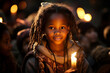 portrait of an African nomad girl holding a candle