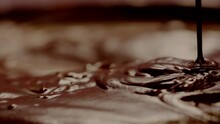 Slow Motion Of Pouring Dark Hot Chocolate.