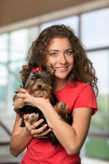 Poster - A young charming girl walking with a dog.