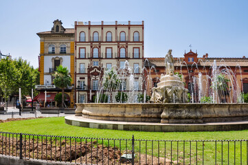 Wall Mural - Fuente de Sevilla fountain on Puerta de Jerez square, Seville, Spain