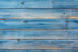 © Enigma - Weathered blue wooden planks line up to create a textured background, showcasing the rustic charm of distressed wood with a vintage feel.