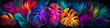 Colorful tropical leaves in neon color on a dark background.