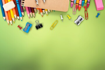 Poster - Back to school. Frame of school supplies on background.