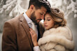 © Marco Attano - Winter wonderland wedding portrait, snowy landscape, couple wrapped in a luxurious faux fur stole, warm embrace