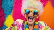 © Pelayo - Portrait of a happy senior woman in colorful outfit
