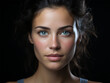 close-up portrait of a young woman with blue eyes and clear skin on a black background. beauty and skin care concept