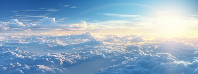 Wall Mural - a view of the sky from a plane window of clouds