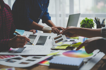 Web creative team Graphic designer planning for mobile phone choose color template draw app website ux ui for mobile application and development model Prototype outline development process.