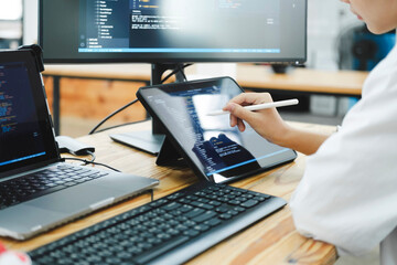 IT Programmer Starts Working on Desktop Computer.