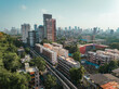 © Manvendra - Aerial view of Mumbai city, Maharashtra, India. Beautiful weather in Mumbai during the monsoon. Mumbai skyline, Modern City high-rise skyscraper buildings.