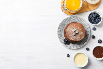 Wall Mural - Chocolate pancakes, tasty breakfast, concept of delicious food, space for text