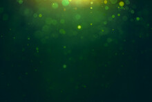 Dark Green Background With Gold Out-of-focus Backlight. Festive Background For St. Patrick's Day