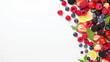 A vibrant mix of berries and citrus fruits on a white background
