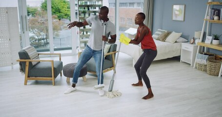 Poster - Dance, music or black couple cleaning in living room with a broom for singing a song on radio. Cleaners, freedom or happy woman enjoys listening or streaming audio with an African man or singer