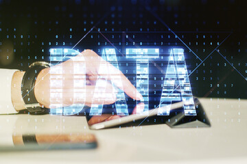 Wall Mural - creative data word sign and finger clicks on a digital tablet on background. multiexposure