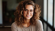 © Synthetica - Portrait of beautiful young woman with curly hair wearing eyeglasses.