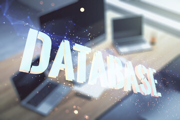 Wall Mural - double exposure of creative database word hologram and modern desktop with laptop on background, res