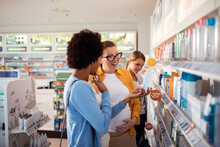Shoppers Consulting on Skincare Products in Pharmacy