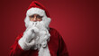 © Fxquadro - Santa Claus gesturing silence with finger on lips, mysterious holiday secret concept