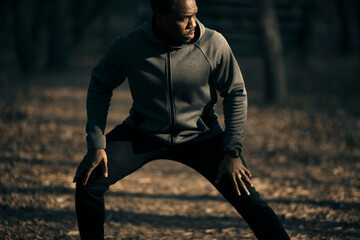 Wall Mural - Athlete Taking a Break During Outdoor Workout