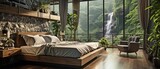 A bedroom overlooking a forest with waterfalls